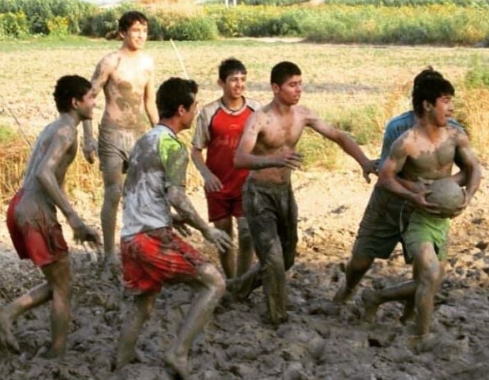 Fazel Atrachali playing with his friends during his childhood
