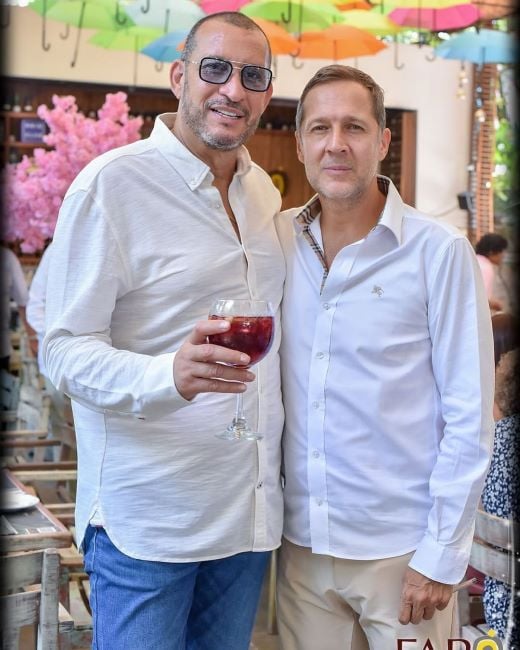 Fernando Solorzano holding a glass of alcohol
