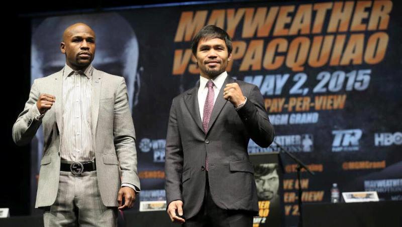 Manny Pacquiao with Floyd Mayweather Jr. (left) during the promotion of their fight