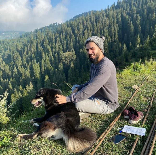 Fotty Seven with a dog