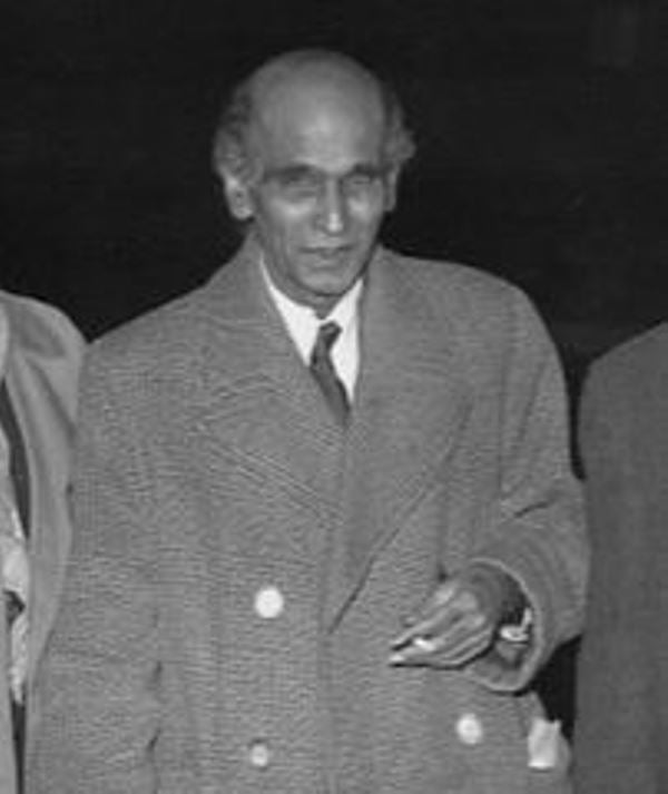 G. D. Naidu smoking cigarette