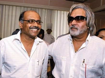 G. R. Gopinath posing with Vijay Mallya