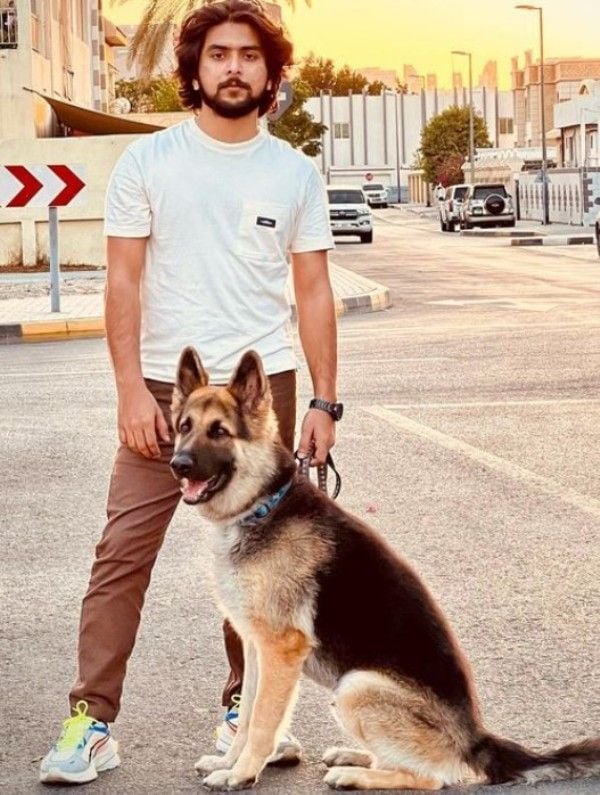 Gabri Jose with his pet dog