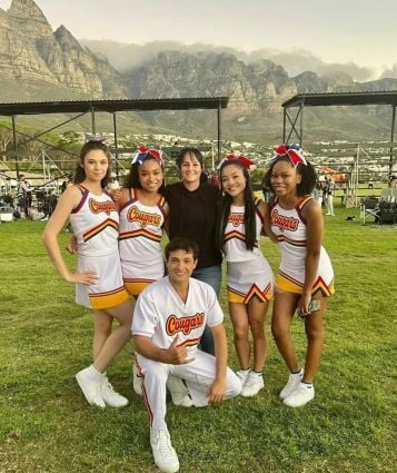 Genneya Walton (second from left) with the cast and crew of the series Darby and the Dead