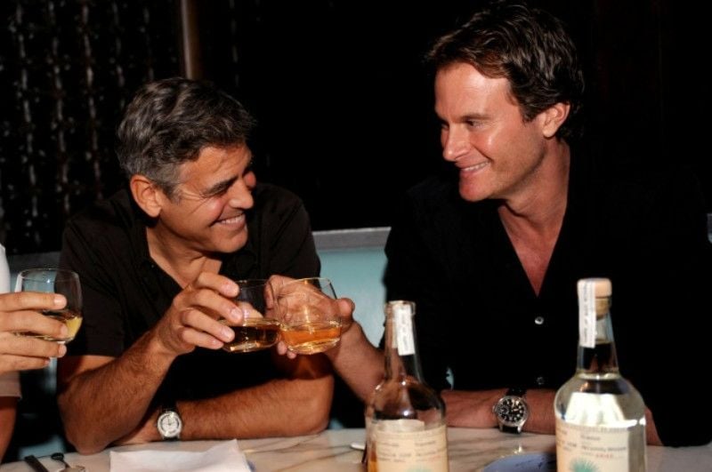 George Clooney (left) while consuming alcohol