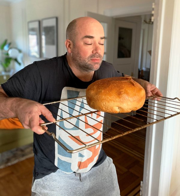 Gijs van der Most taking in the aroma of freshly baked bread which he made