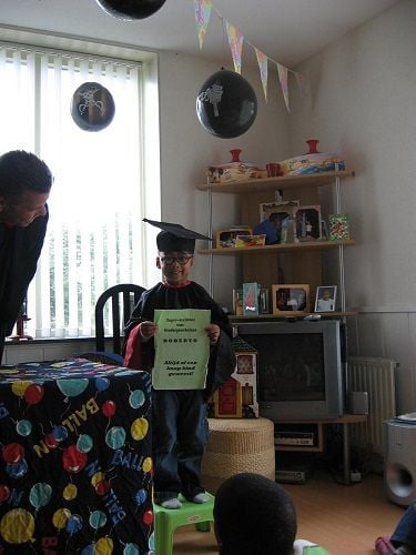 Giomero Alwin Brand wearing glasses