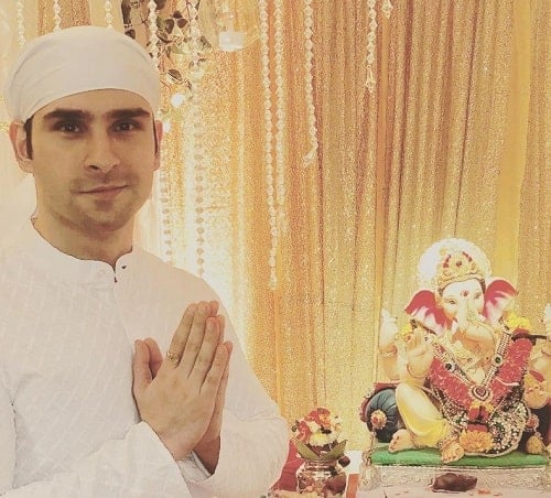 Girish Kumar with an idol of lord Ganesha