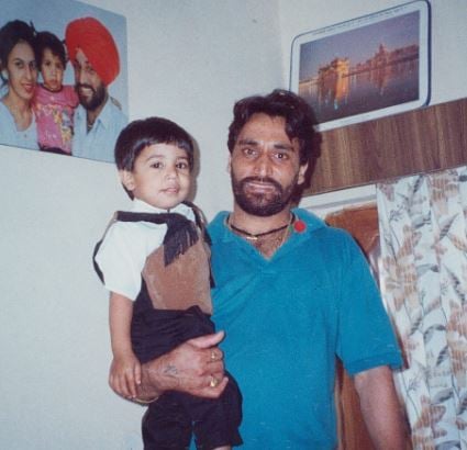 Gitaj Bindrakhia in childhood with his father