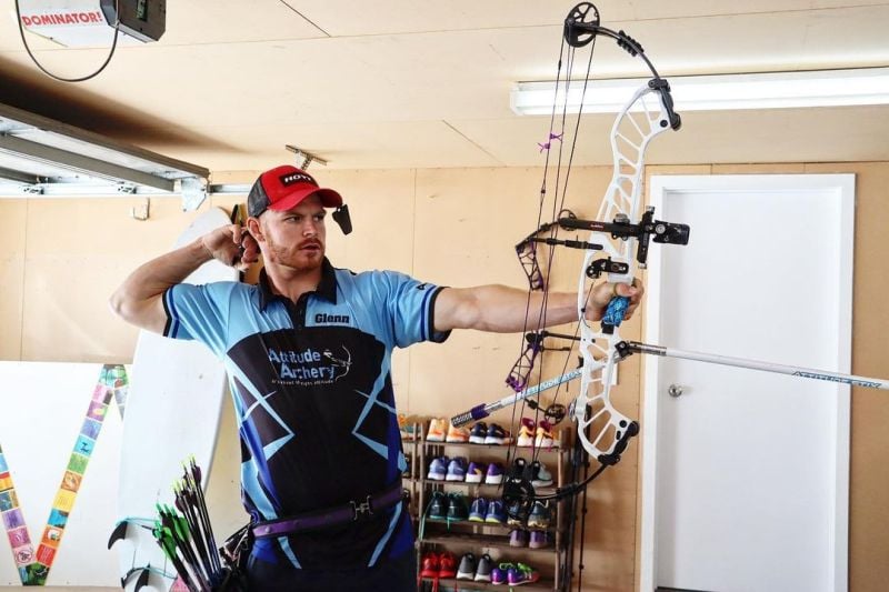 Glenn Phillips practicing archery