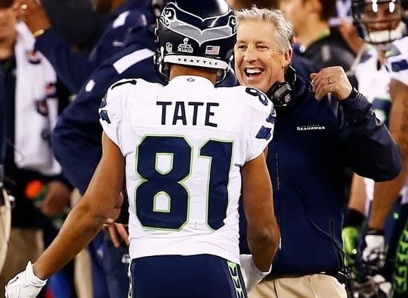 Golden Tate with coach as a player of the Seattle Seahawks