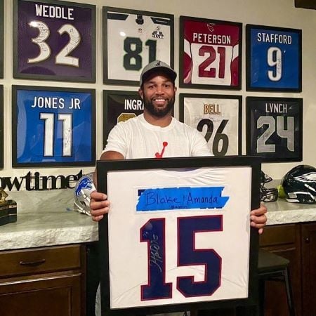 Golden tate with the framed jerseys