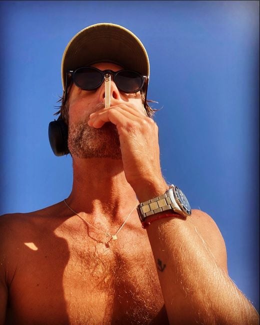 Goncalo Beja da Costa smoking a cigarette