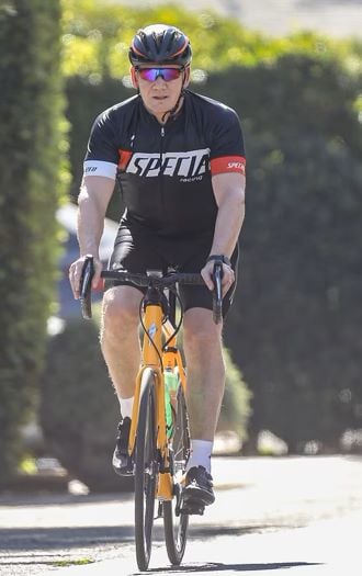 Gordon Ramsay riding a cycle