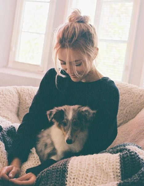 Grace Van Dien with her pet dog Pluto