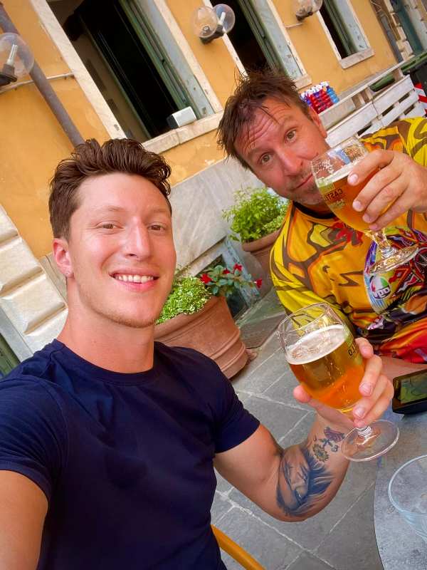 Grant Larsen (left) while having a beer