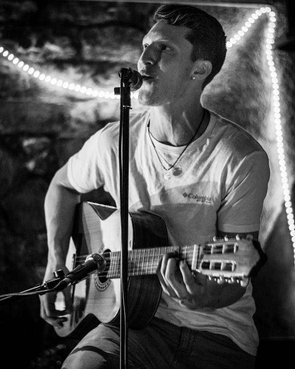 Grant Larsen while performing at an event