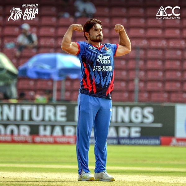 Gulbadin Naib celebrating in a match after taking a wicket