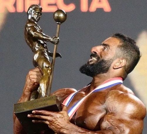 Hadi Choopan with Mr Olympia 2022 trophy
