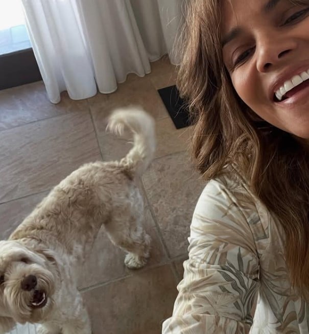 Halle Berry posing with one of her pets