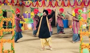 Harby Sangha performing as a singer