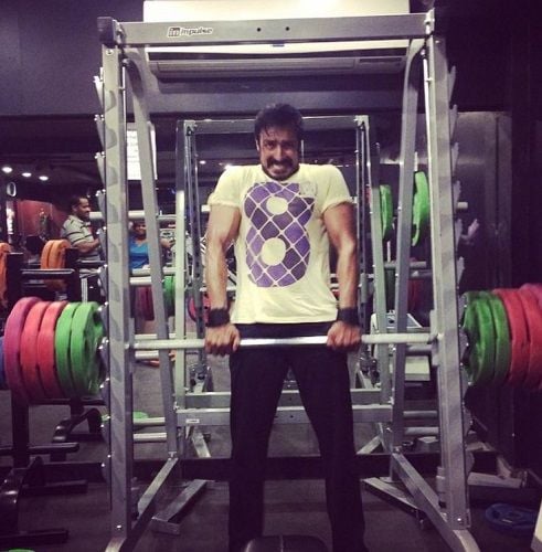Harish Uthaman working out in a gym