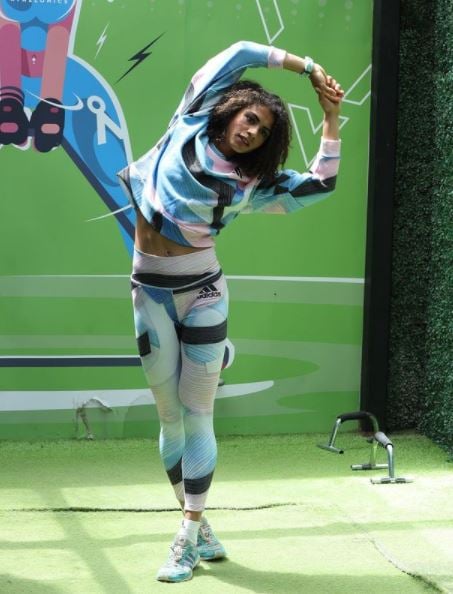 Harmilan performing her routine exercises