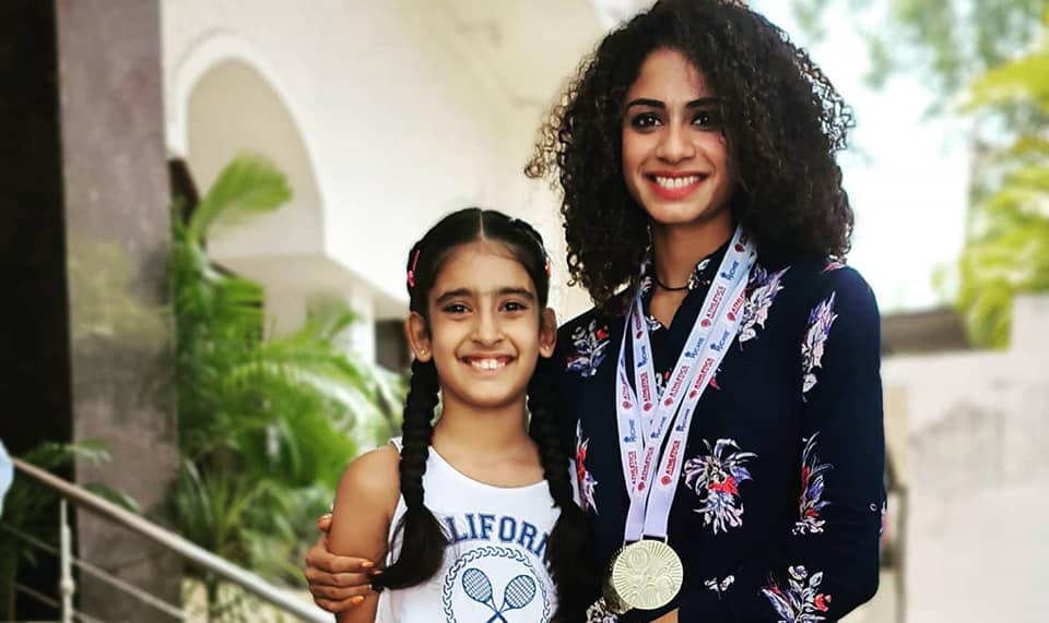 Harmilan with a young fan