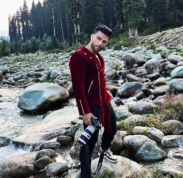 Harsh Arora while doing photography