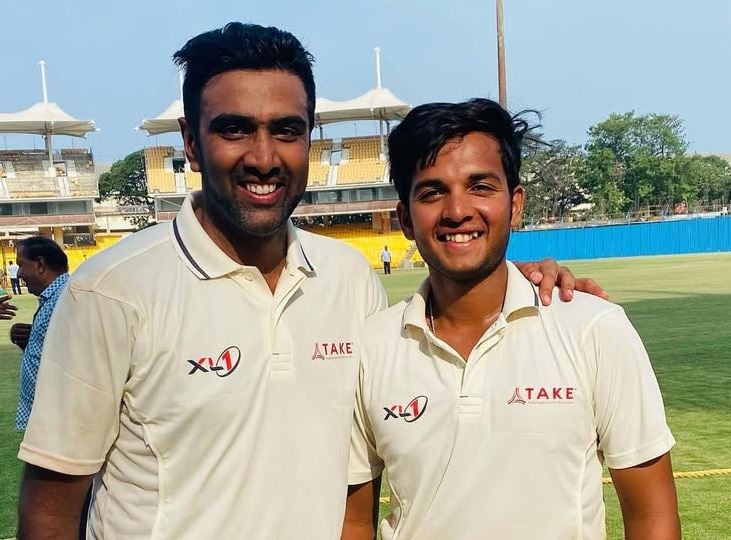Harsh Dubey with Ravichandran Ashwin after scoring a century for MRC-A