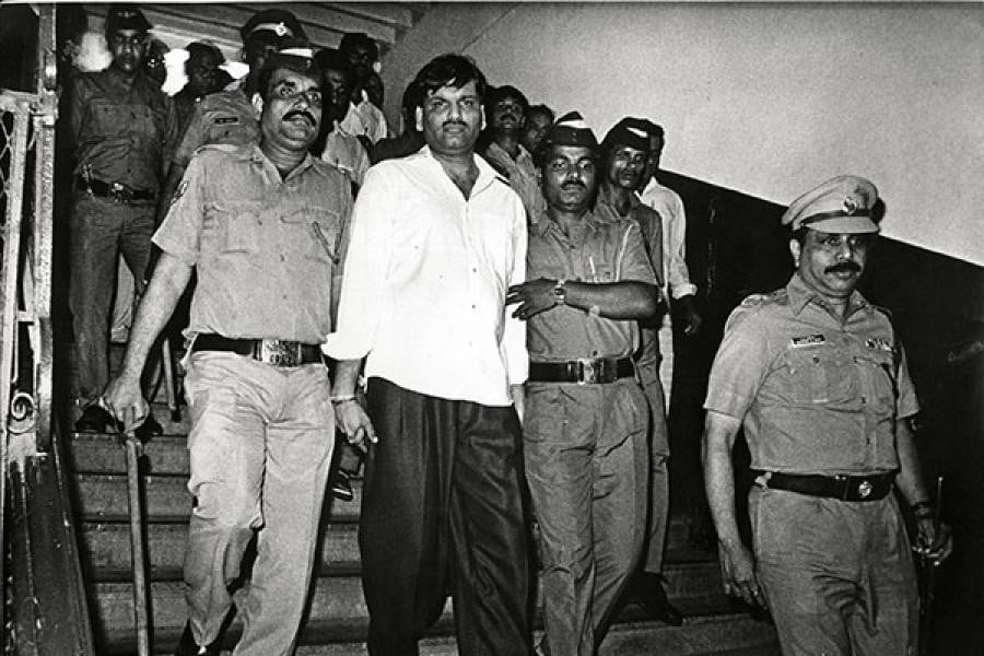 Harshad Mehta being taken away after having been arrested by the Mumbai Police