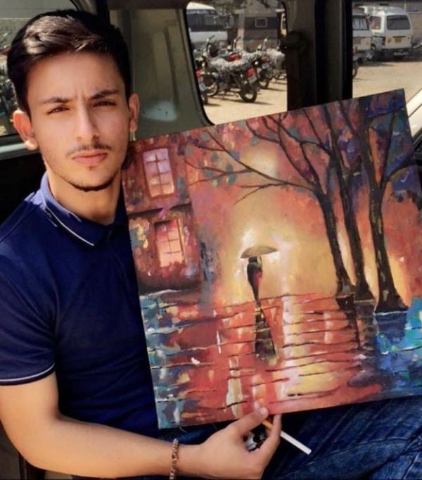 Hasan Raheem with a cigarette in his hand