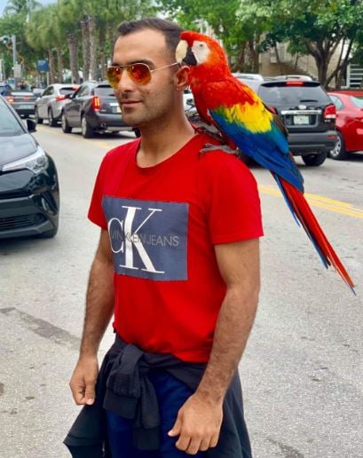 Hashmatullah Shahidi with a bird