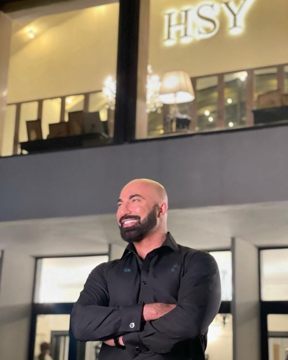 Hassan Sheheryar Yasin in front of HSY Mansion