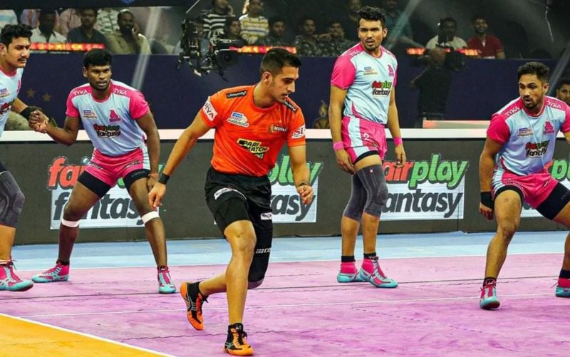 Heidar Ali Ekrami (in orange) during a match in the Pro Kabaddi League 2022 (season 9)
