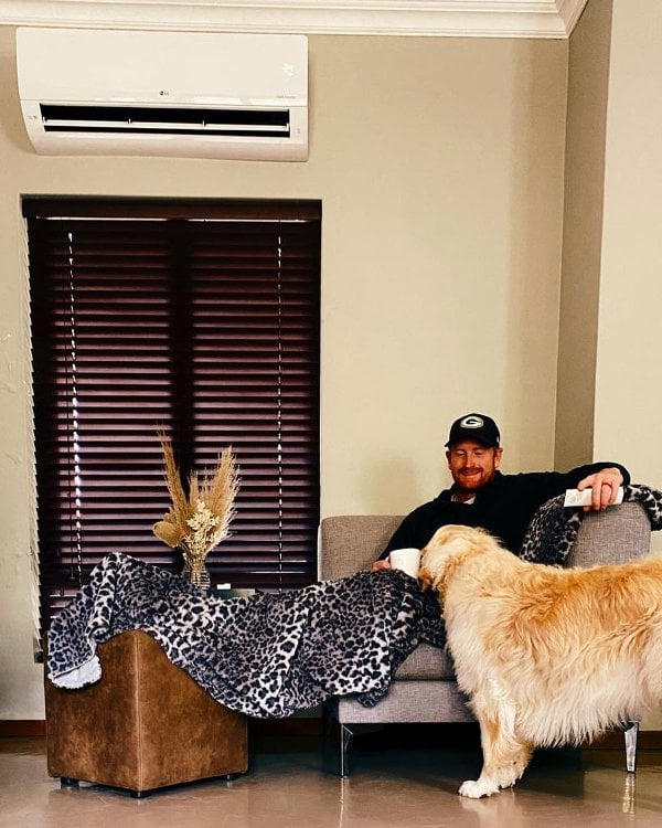 Heinrich Klaasen with his pet dog