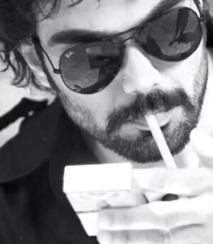 Heramb Tripathi while smoking a cigarette