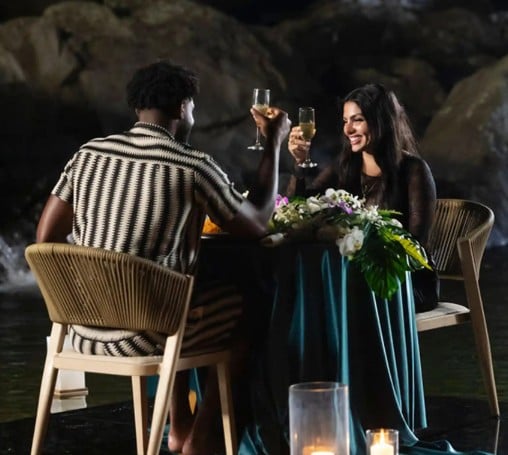 Huda Mustafa while enjoying an alcoholic beverage