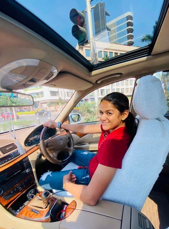 Humaira Kazi driving a car
