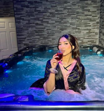 Humna Naeem while enjoying wine