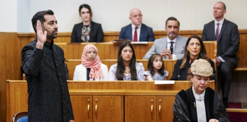 Humza Yousaf taking the oath as he is sworn in as First Minister of Scotland at the Court of Session, Edinburgh in 2023