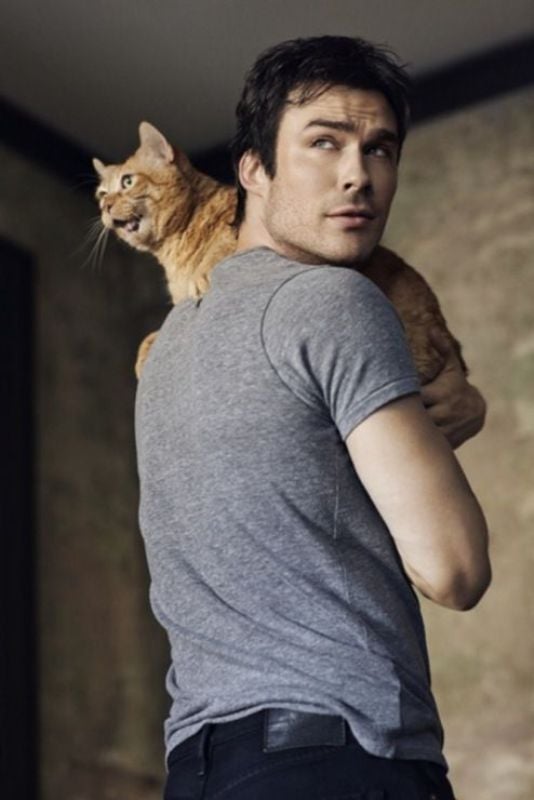 Ian Somerhalder while posing with his cat Moke at People