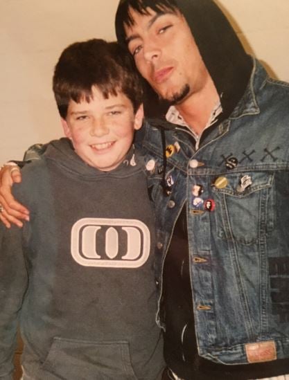 Ian Watkins with a child