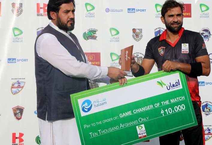 Iftikhar Ahmed (right) after winning a Game Changer of the Match award in 2022 Shpageeza Cricket League