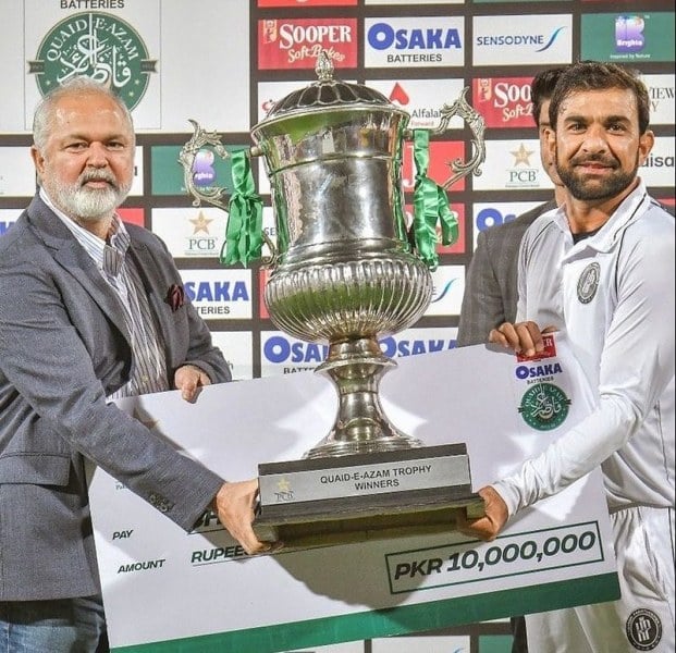 Iftikhar Ahmed (right) after winning the Quaid-e-Azam Trophy