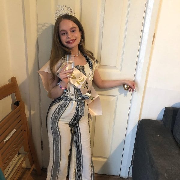 Imogen Faith Reid while having wine on the occasion of her 25th birthday