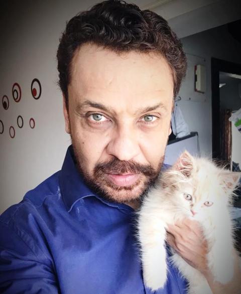 Imran Hasnee, a cat lover