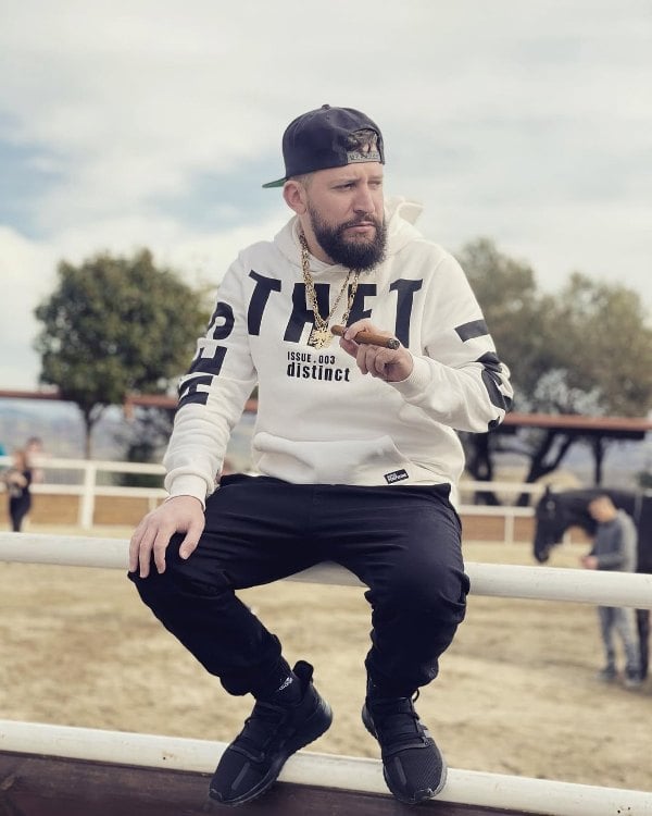 Indrit Murati while smoking a cigar