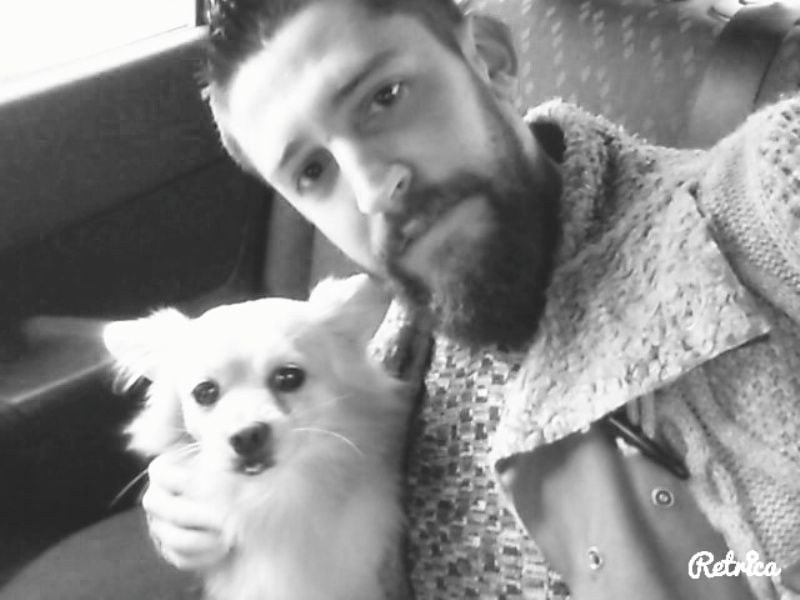 Indrit Murati with a dog named Boby