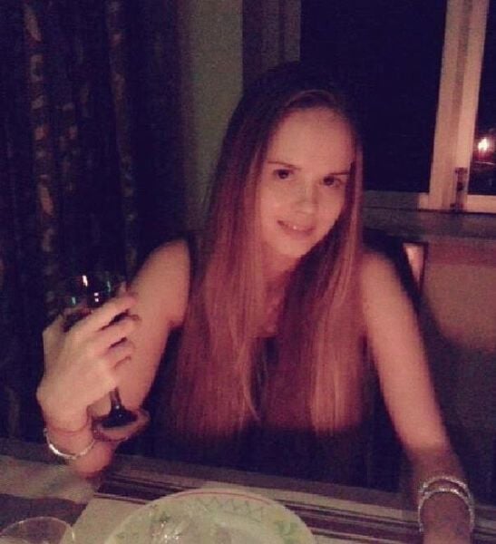 Irina Rudakova drinking wine